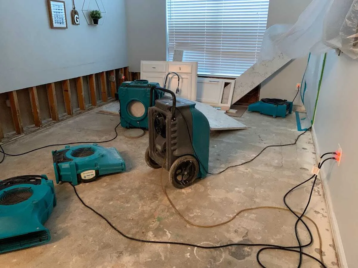 Dehumidifier in flood-cut room for Water Damage Restoration in Middle Valley
